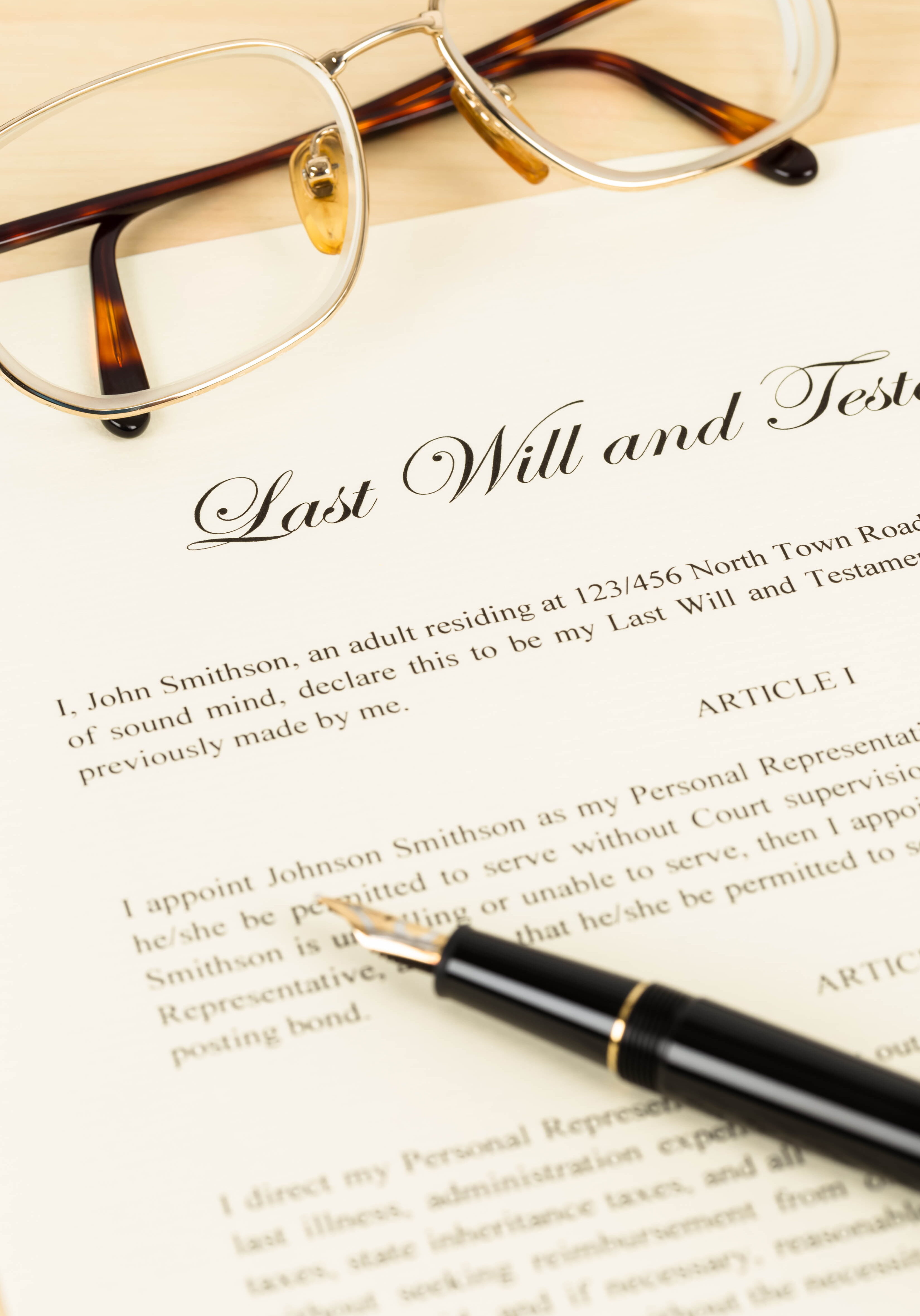 Last will on cream color paper with glasses and pen concept for Last will on cream color paper with glasses and pen concept for legal document.